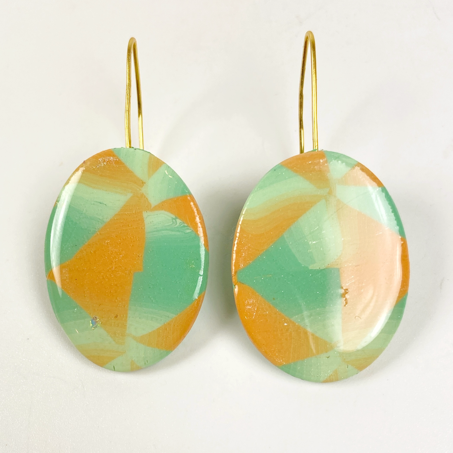 Sage & Terracotta Handmade Polymer Clay Dangle Earrings on neutral background