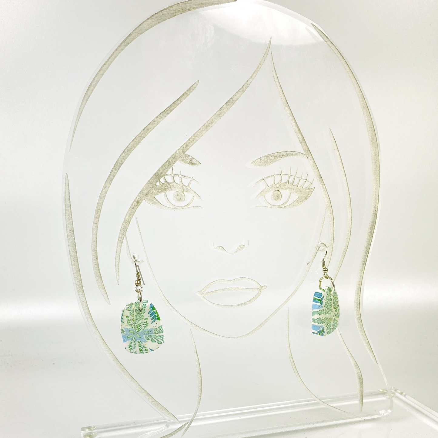 Blue Blossom Handmade Polymer Clay Pendent Earrings on acrylic display head