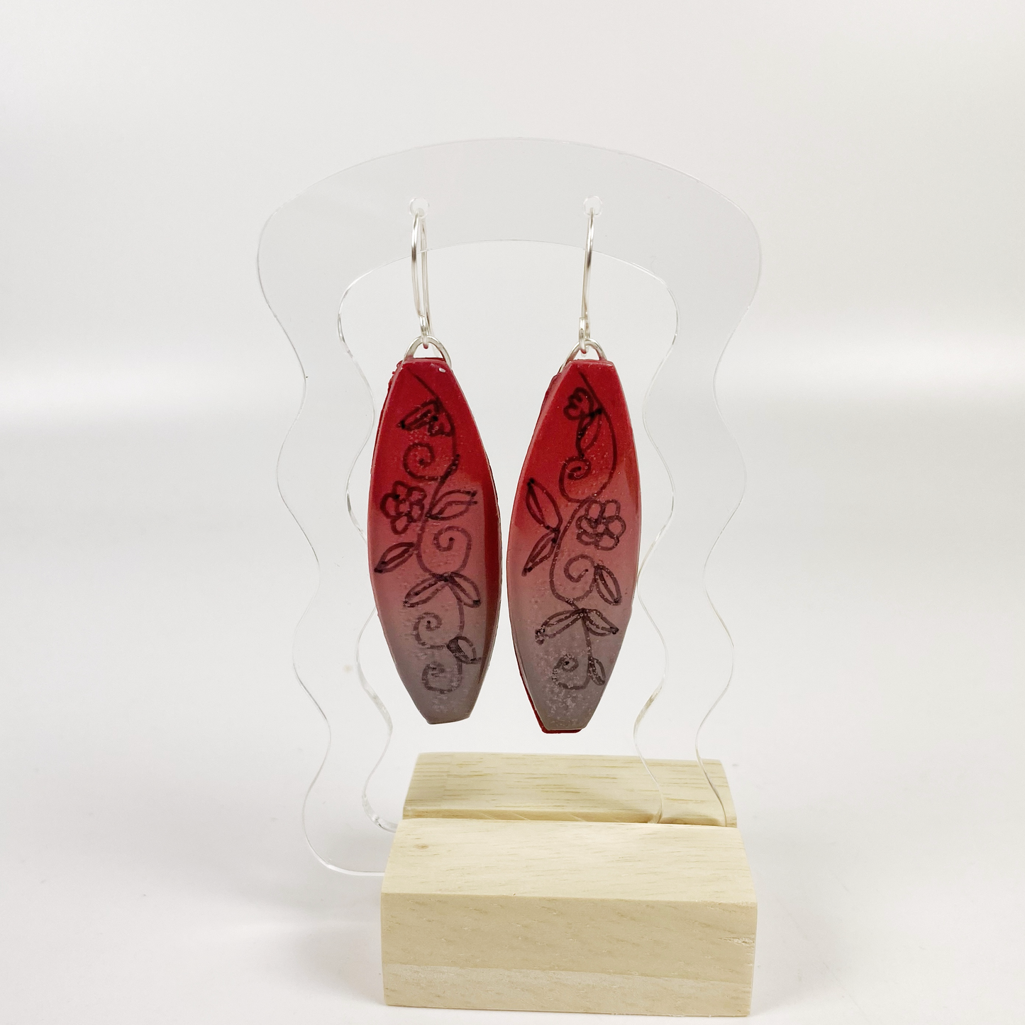 Polymer Clay Twilight Garden Handmade Dangle Earrings on a wood and acrylic display stand
