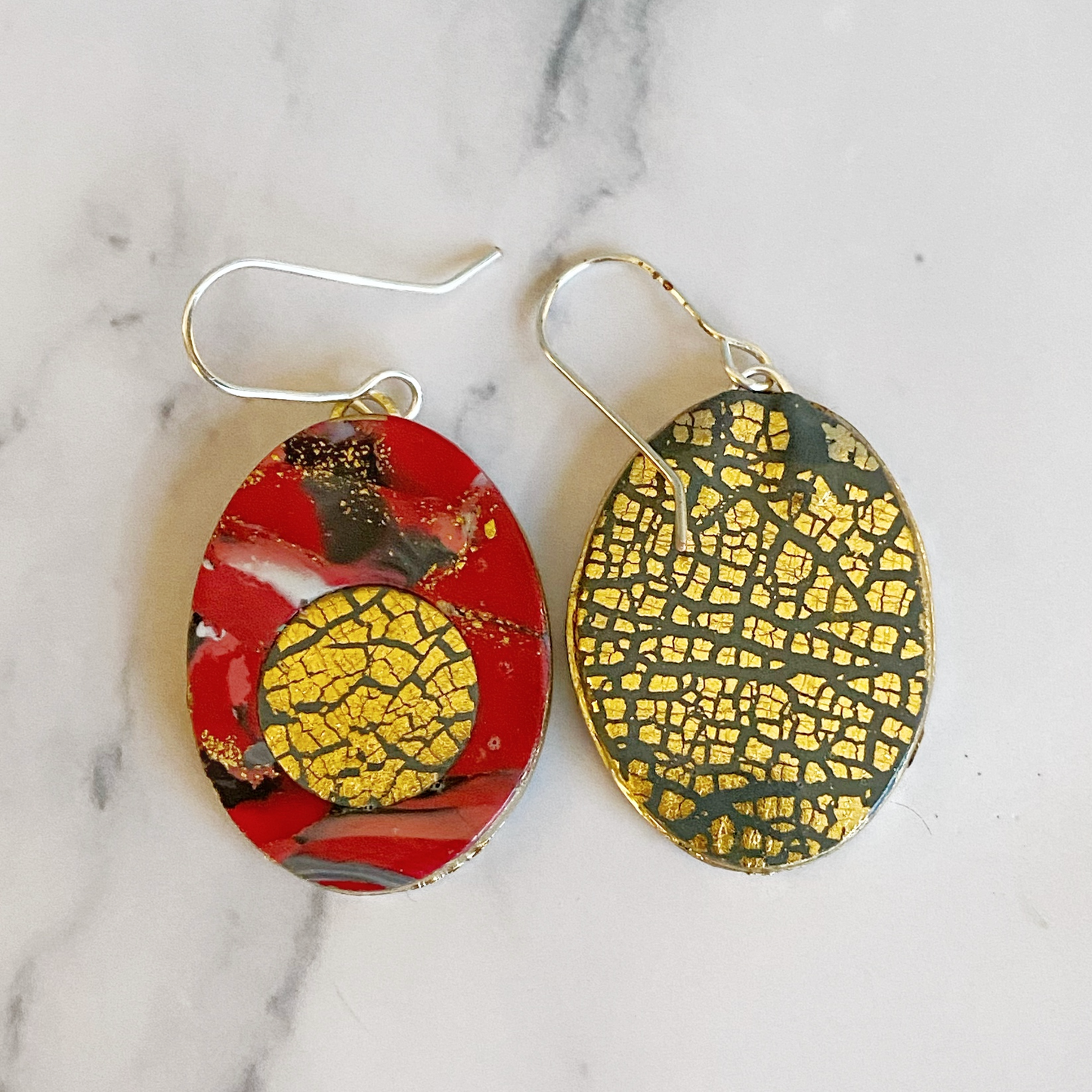 Red Marbled Polymer Clay Earrings with Gold Inset showing the gold crackle reverse side.