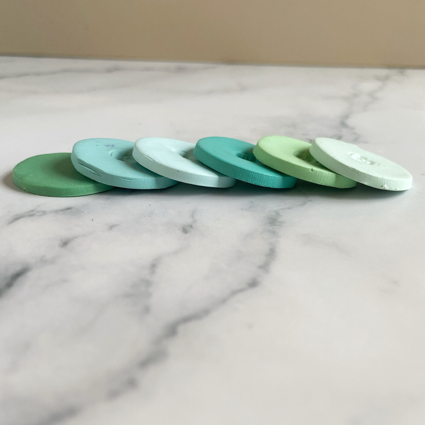 Tide Pool Palette, the sample clay discs shown in a cascade