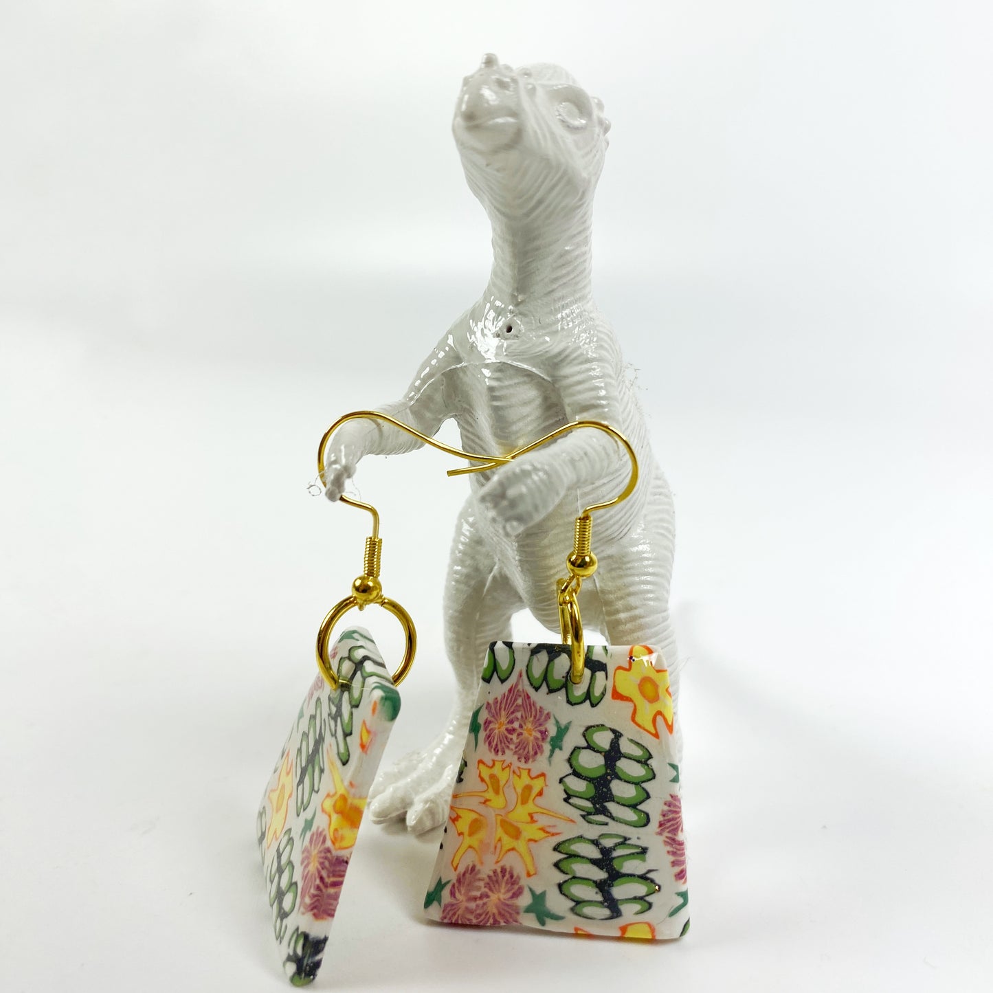 Blossom Burst Handmade Polymer Clay Dangle Earrings with dinosaur