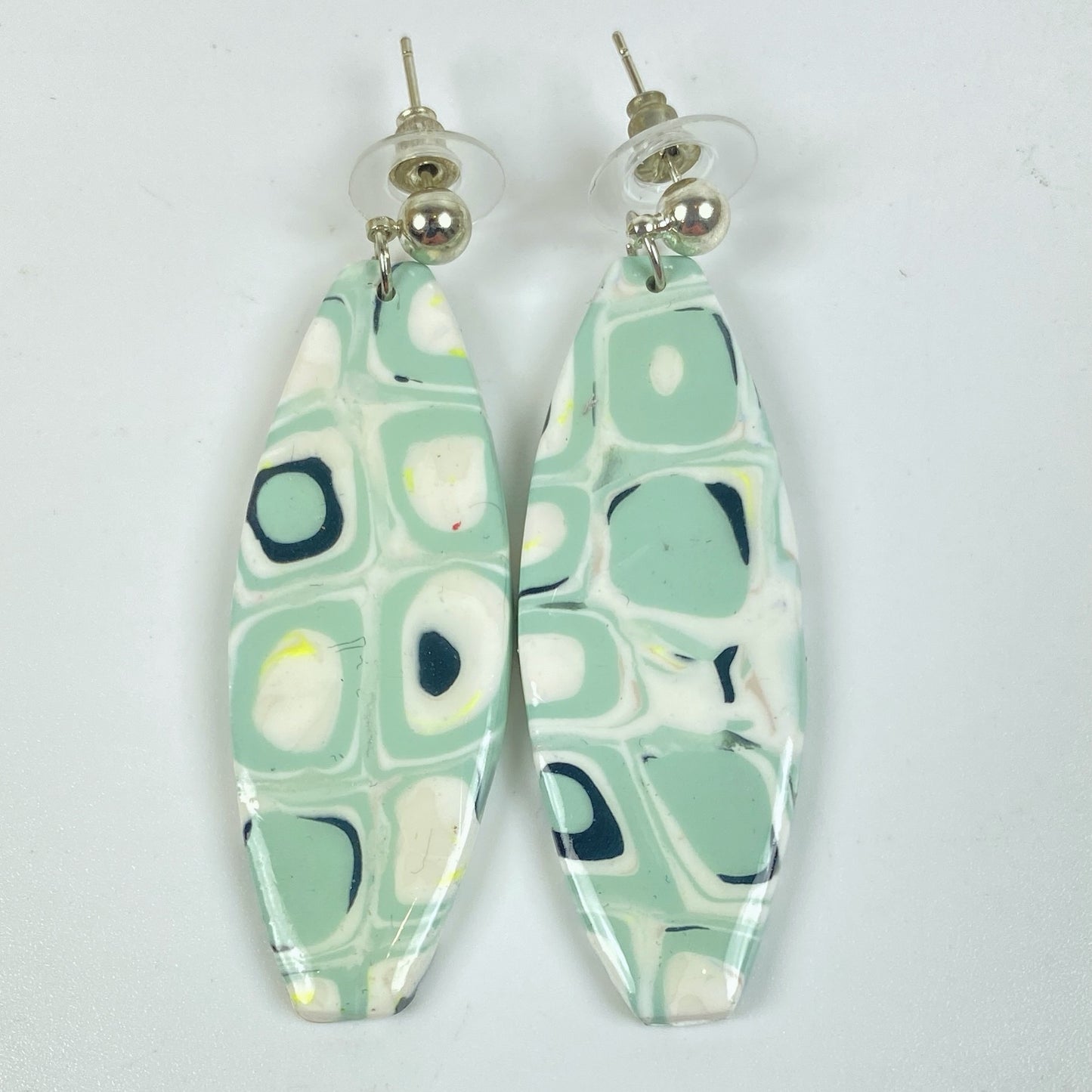 Dreamy Mint Noir Earrings on a neutral background