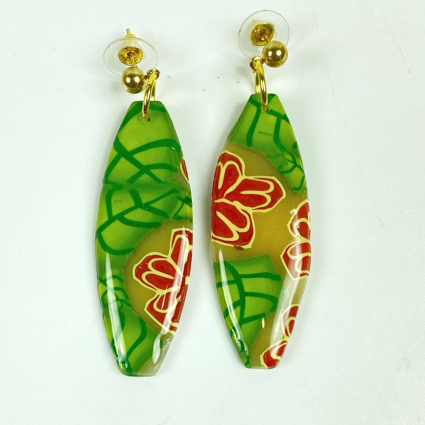 Island Bloom Handmade Polymer Clay Dangle Earrings on a white background