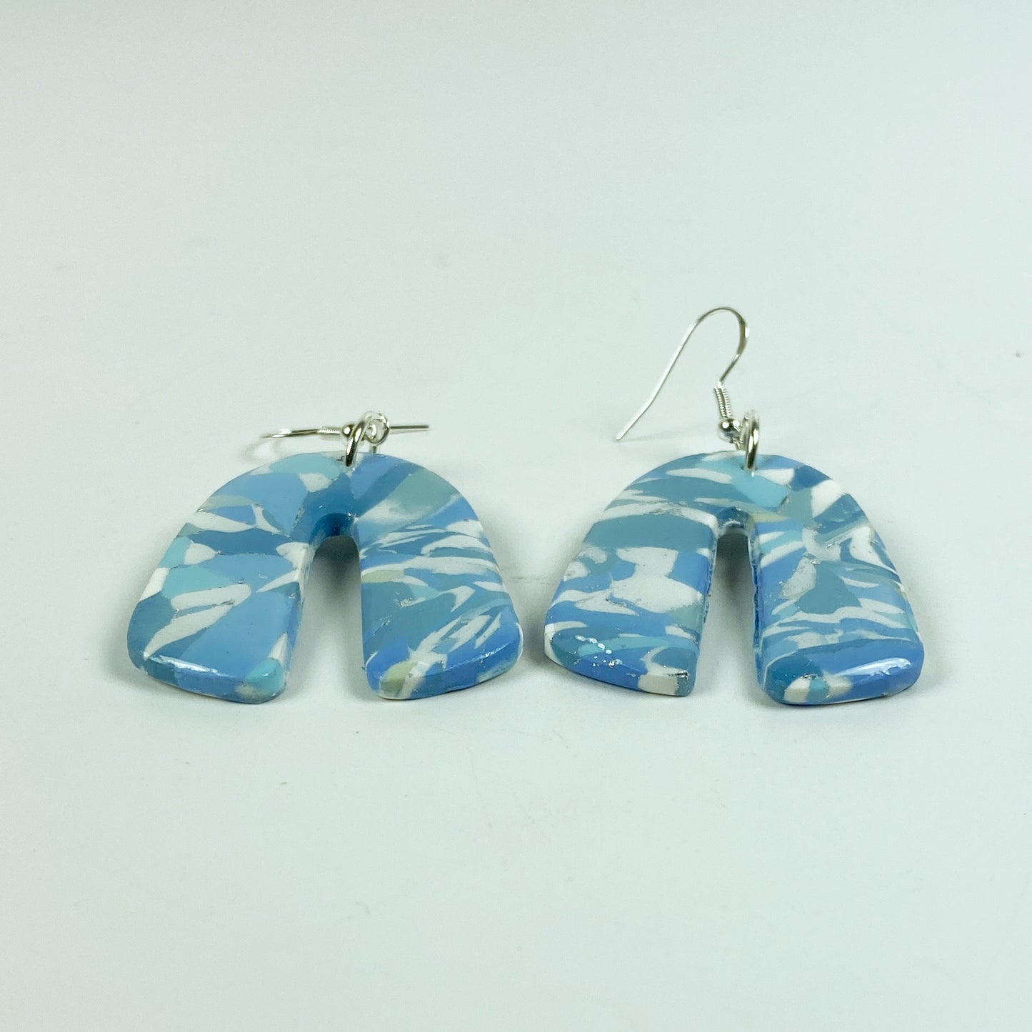 Moody Blue Handmade Polymer Clay Dangle Rainbow Shaped Earrings side view