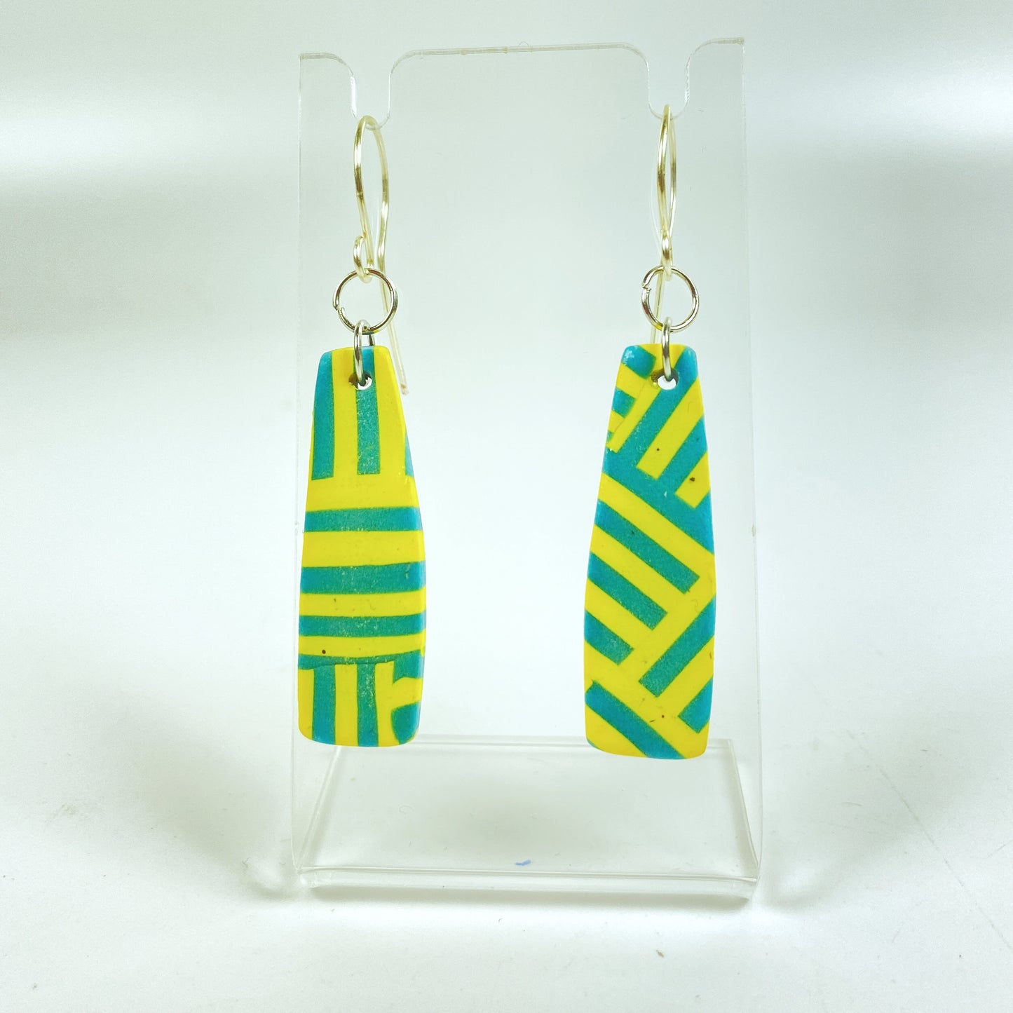 Turquoise & Yellow Braid Handmade Polymer Clay Dangle Earrings on small acrylic display stand