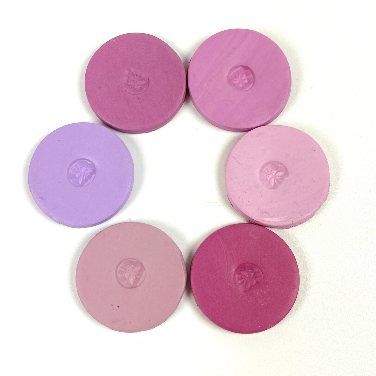 Cupid's Arrows clay color discs in a circle