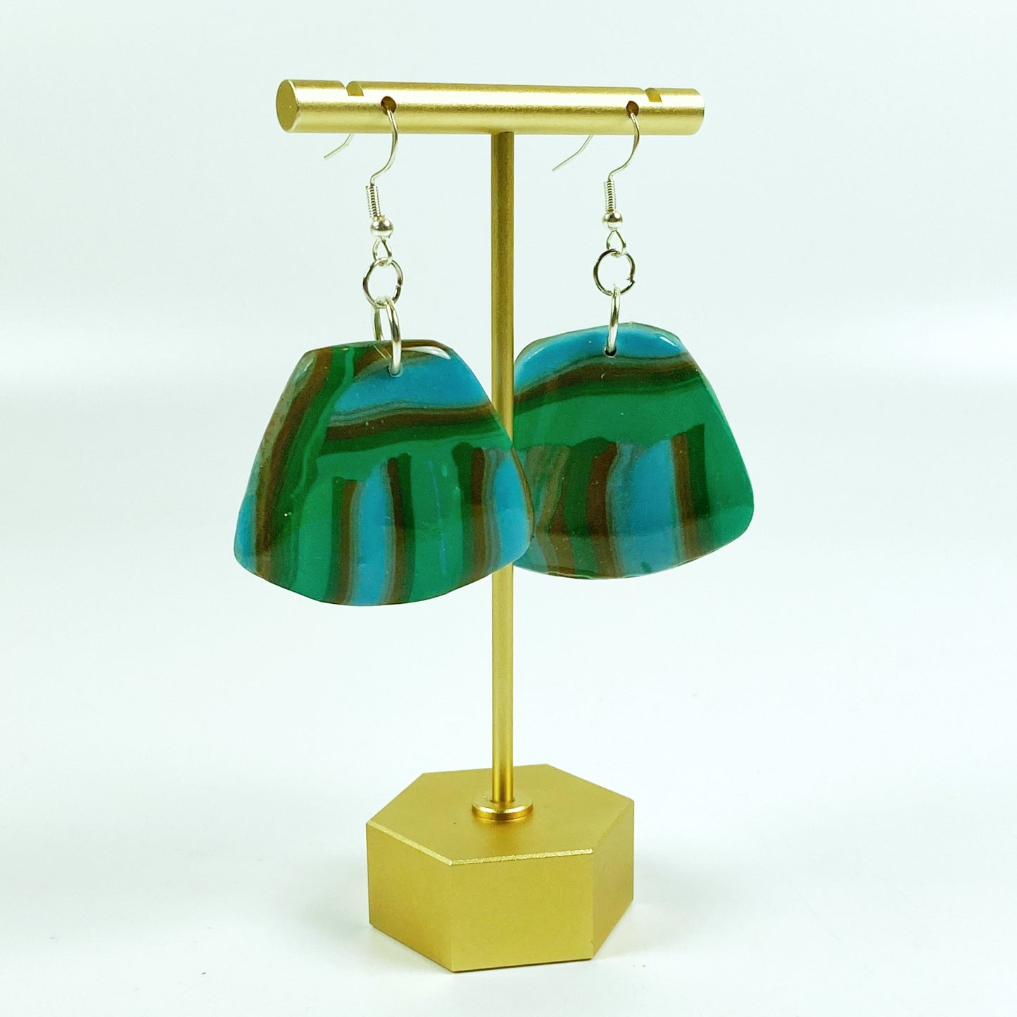 Hip Stripes Handmade Polymer Clay Dangle Earrings on brass earring display stand