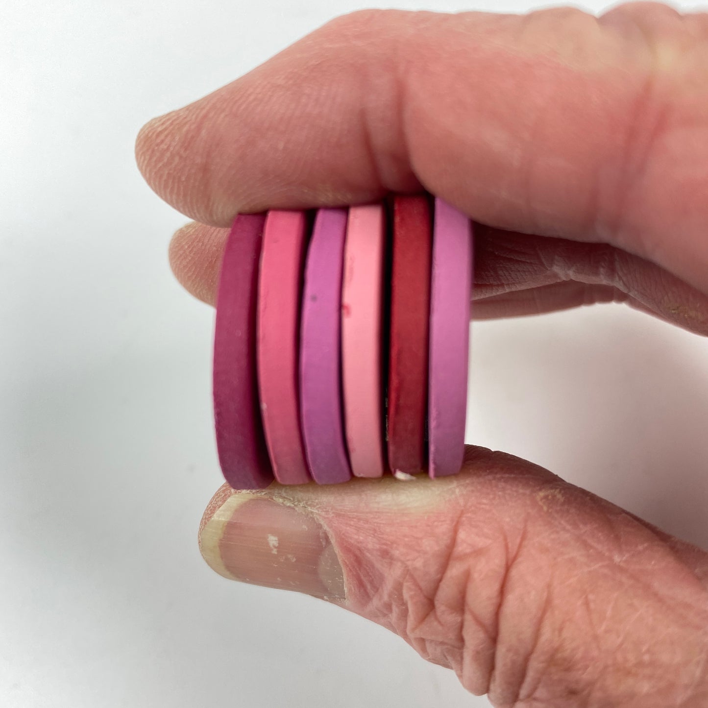 Secret Admirer handheld clay color disk stack
