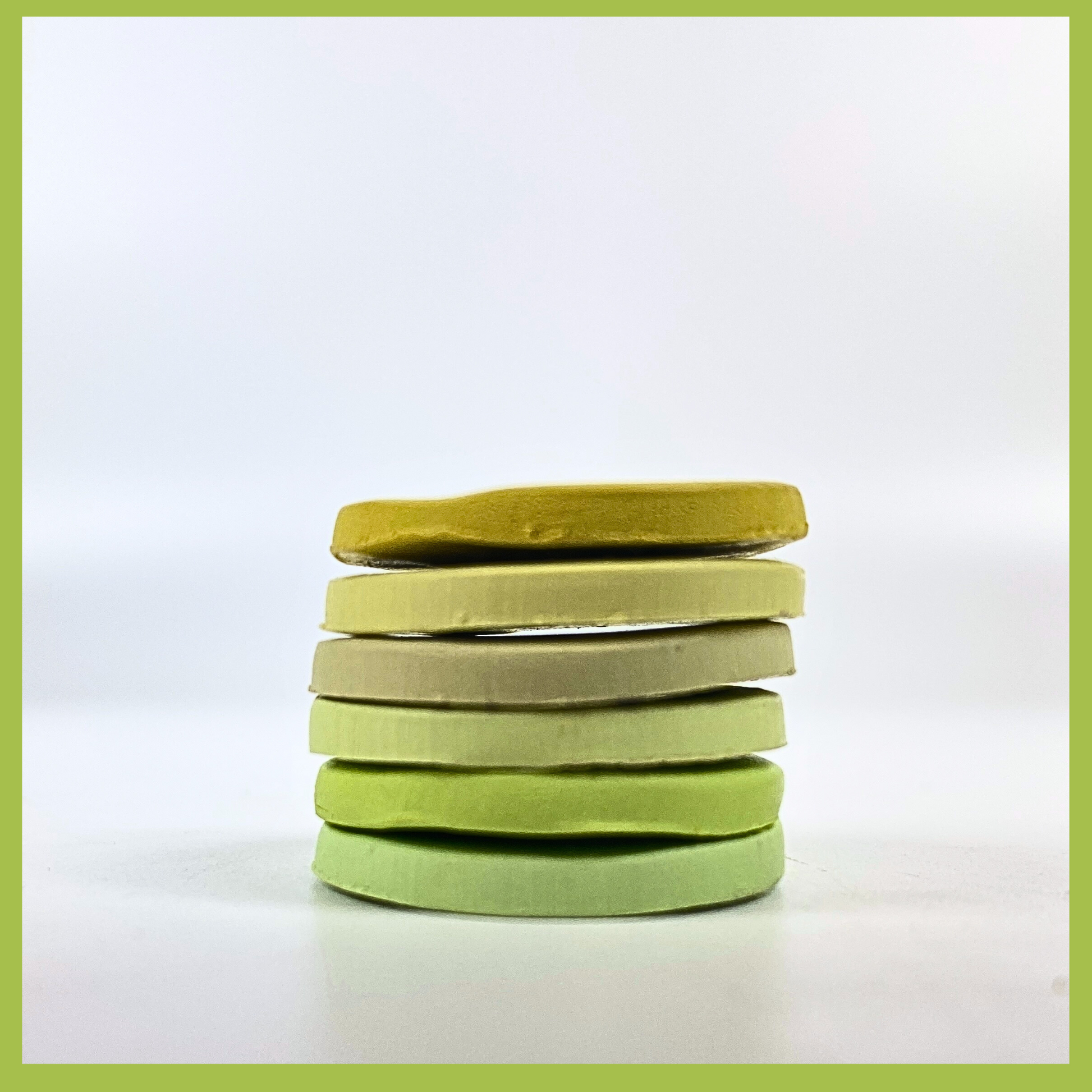 Stack of Spring Green Sample color discs