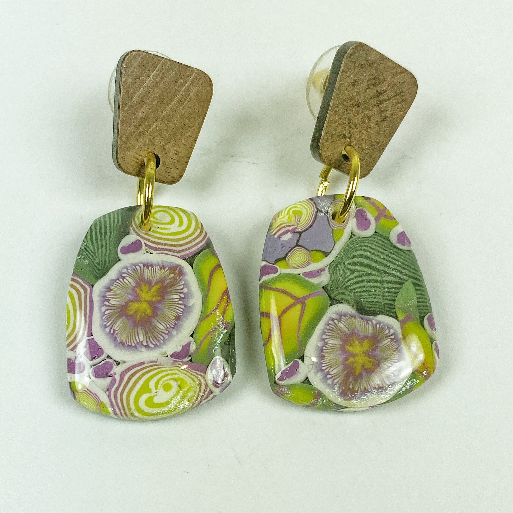 Green Floral Handmade Polymer Clay Dangle Earrings on a white background
