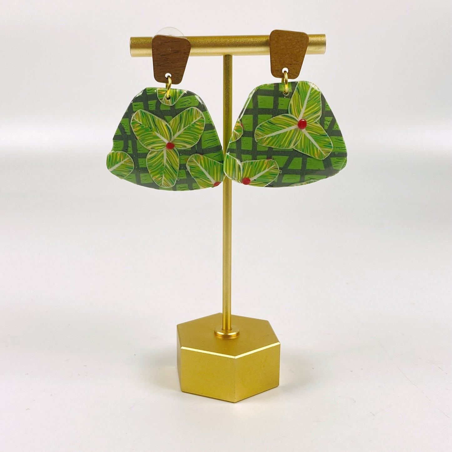 Jungle Canopy Earrings on a brass earring stand