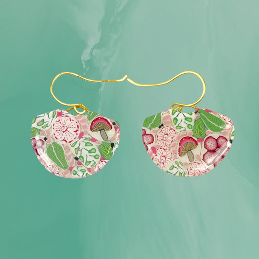 Pink Woodlands Handmade Polymer Clay Dangle Earrings on an aqua background