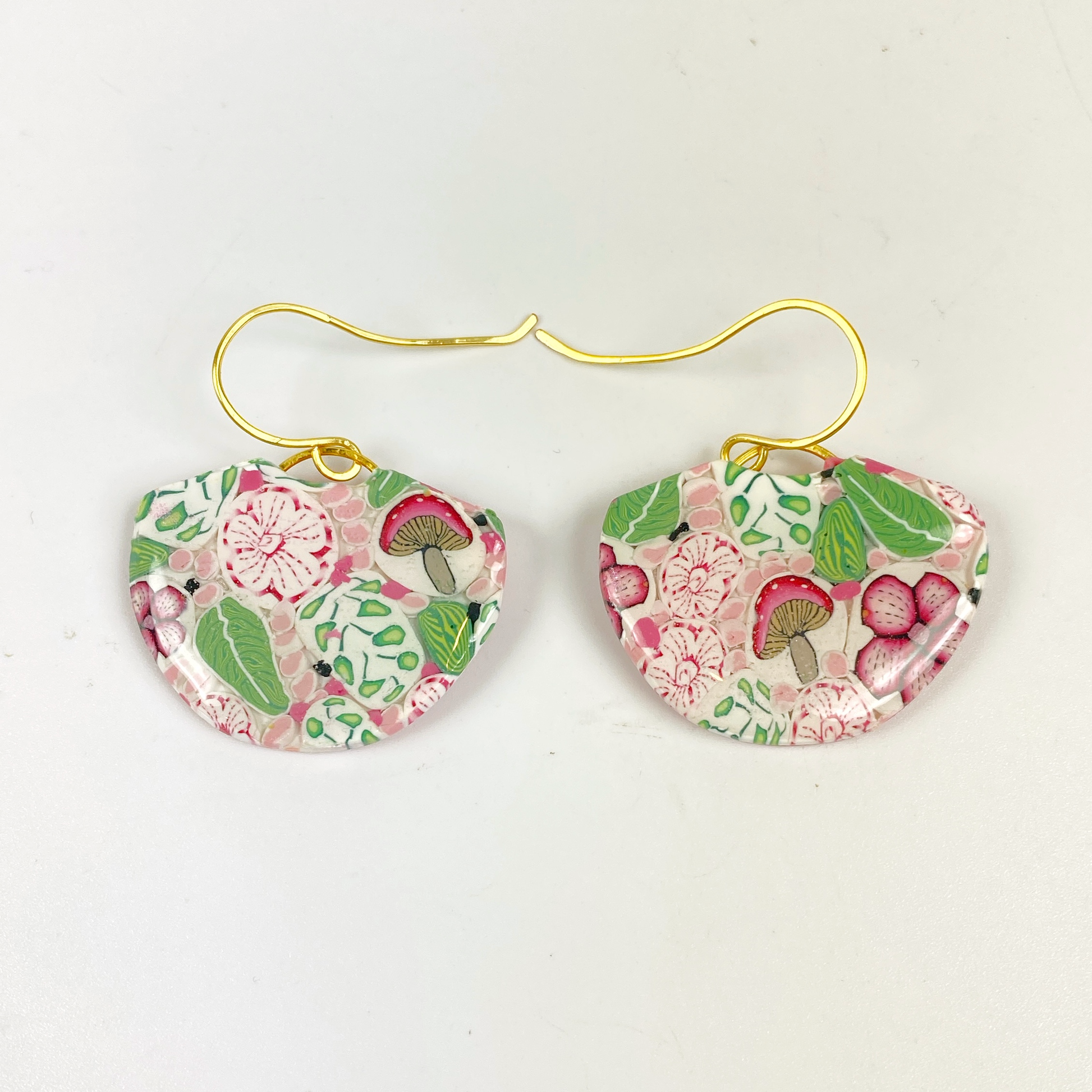 Pink Woodlands Handmade Polymer Clay Dangle Earrings on a neutral background