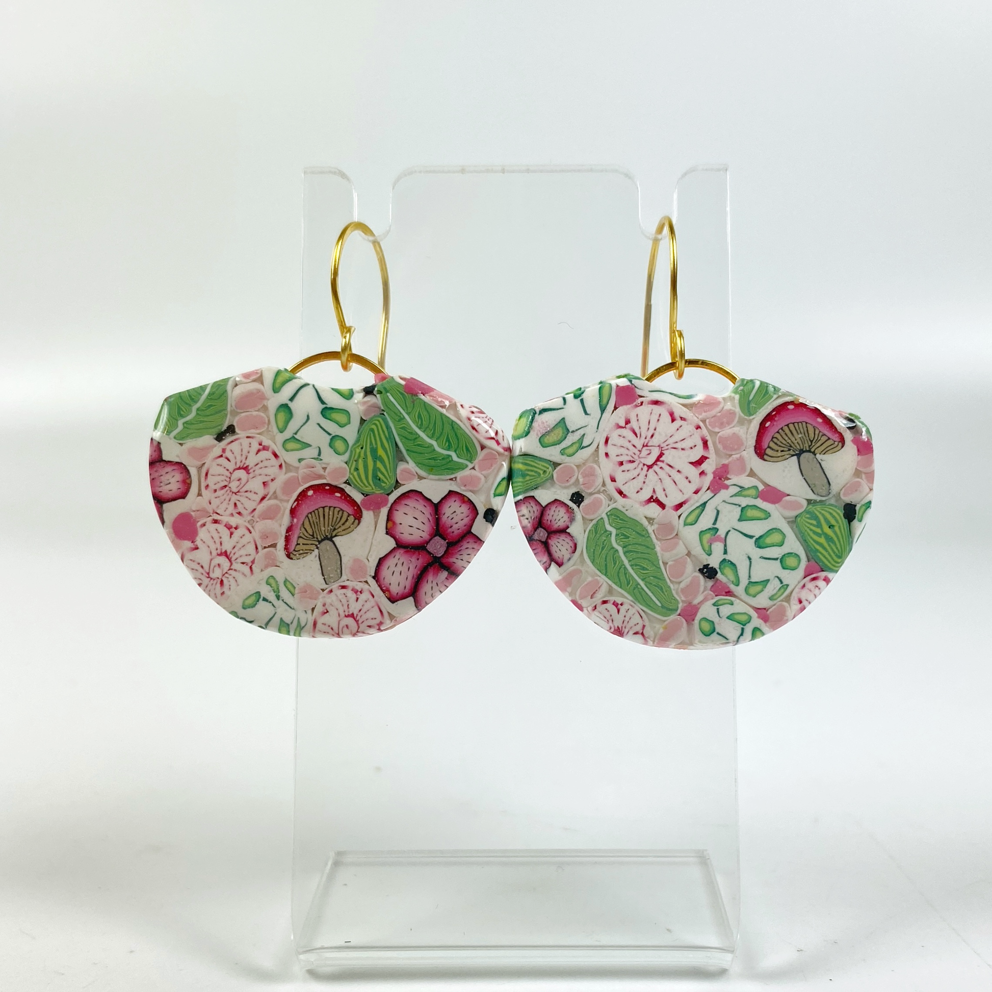 Pink Woodlands Handmade Polymer Clay Dangle Earrings on small acrylic display stand