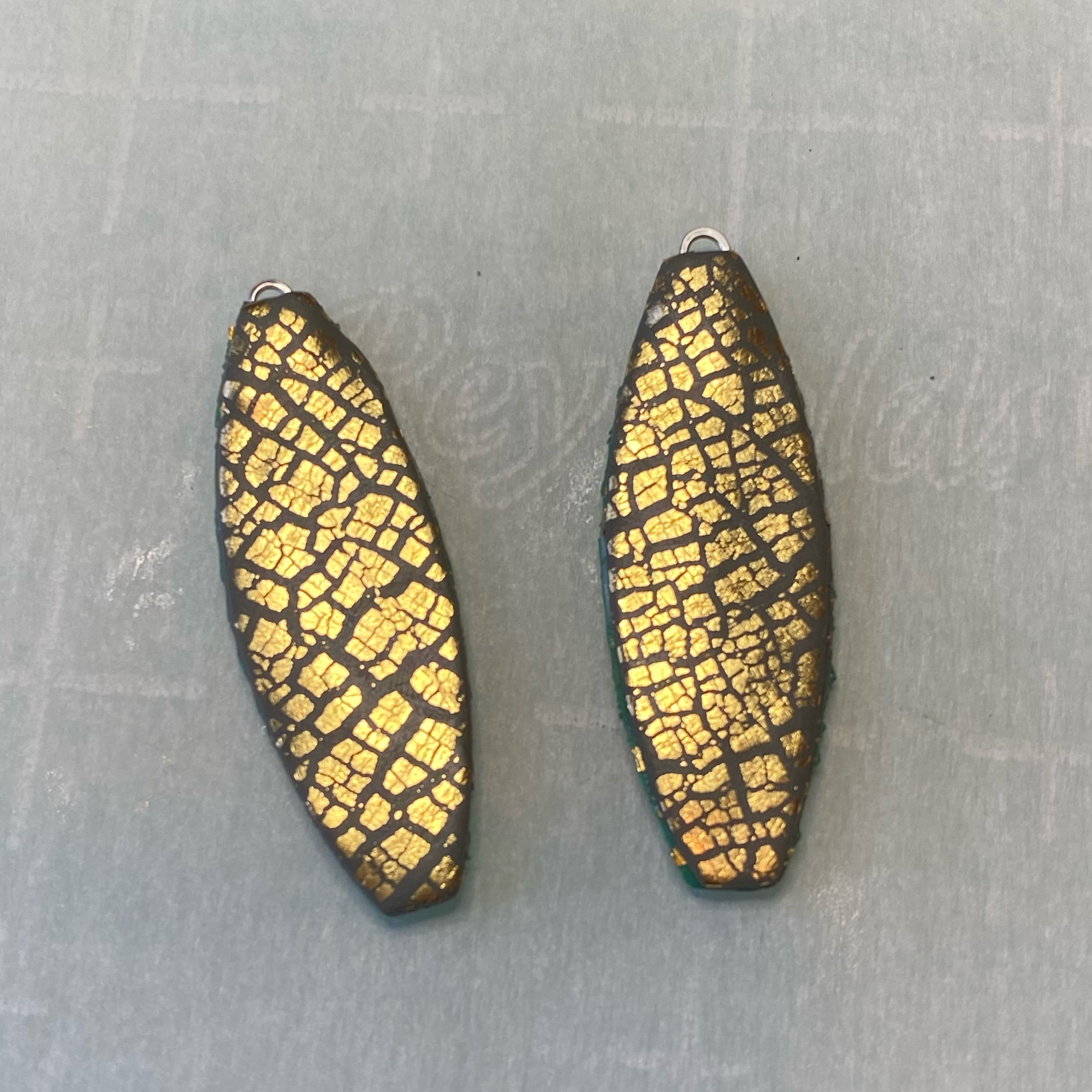 Green Graffiti Handmade Polymer Clay Dangle Earrings showing gold crackle back