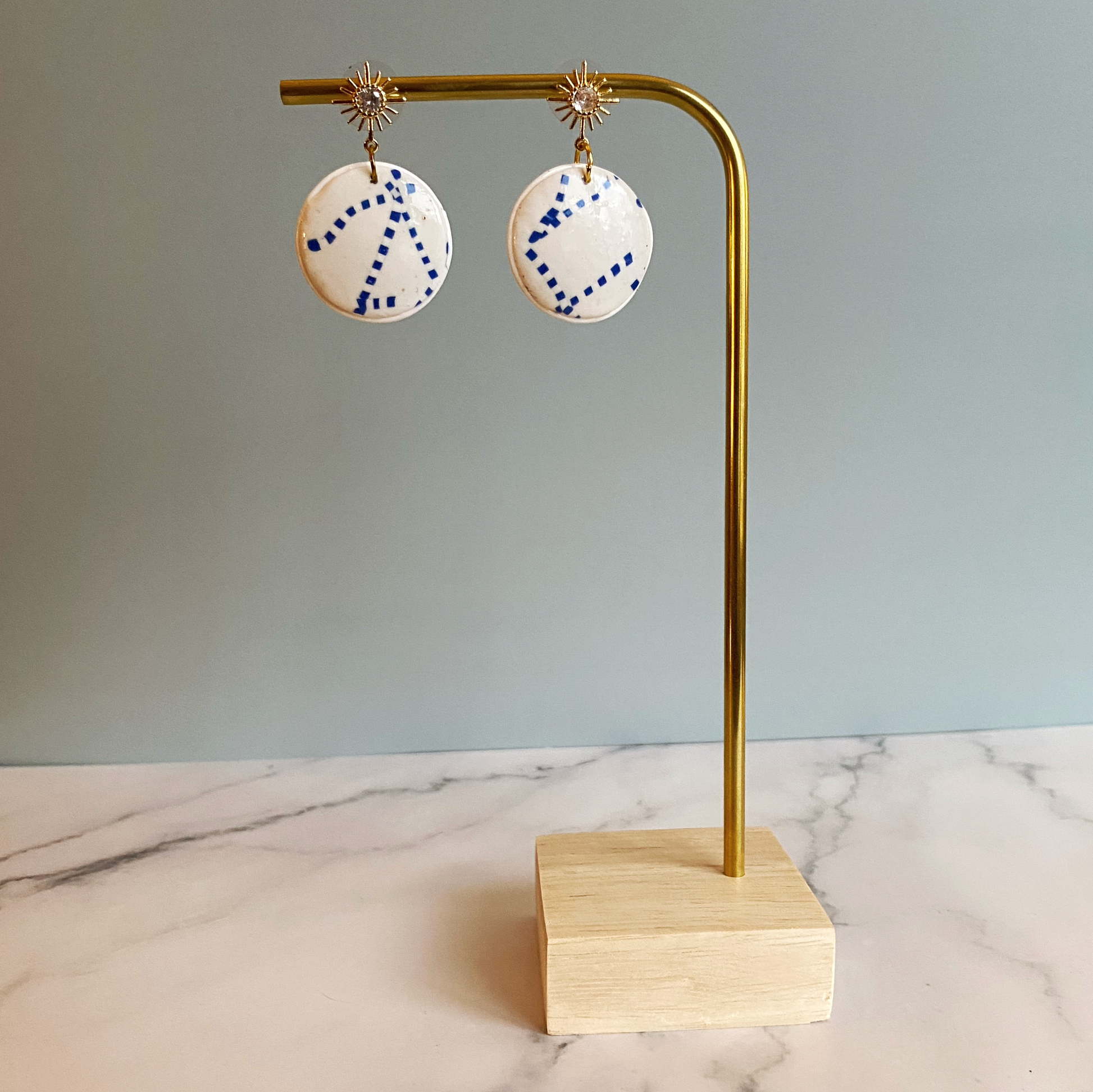 Blue and White Handmade Polymer Clay Dangle Earrings on a brass earring stand