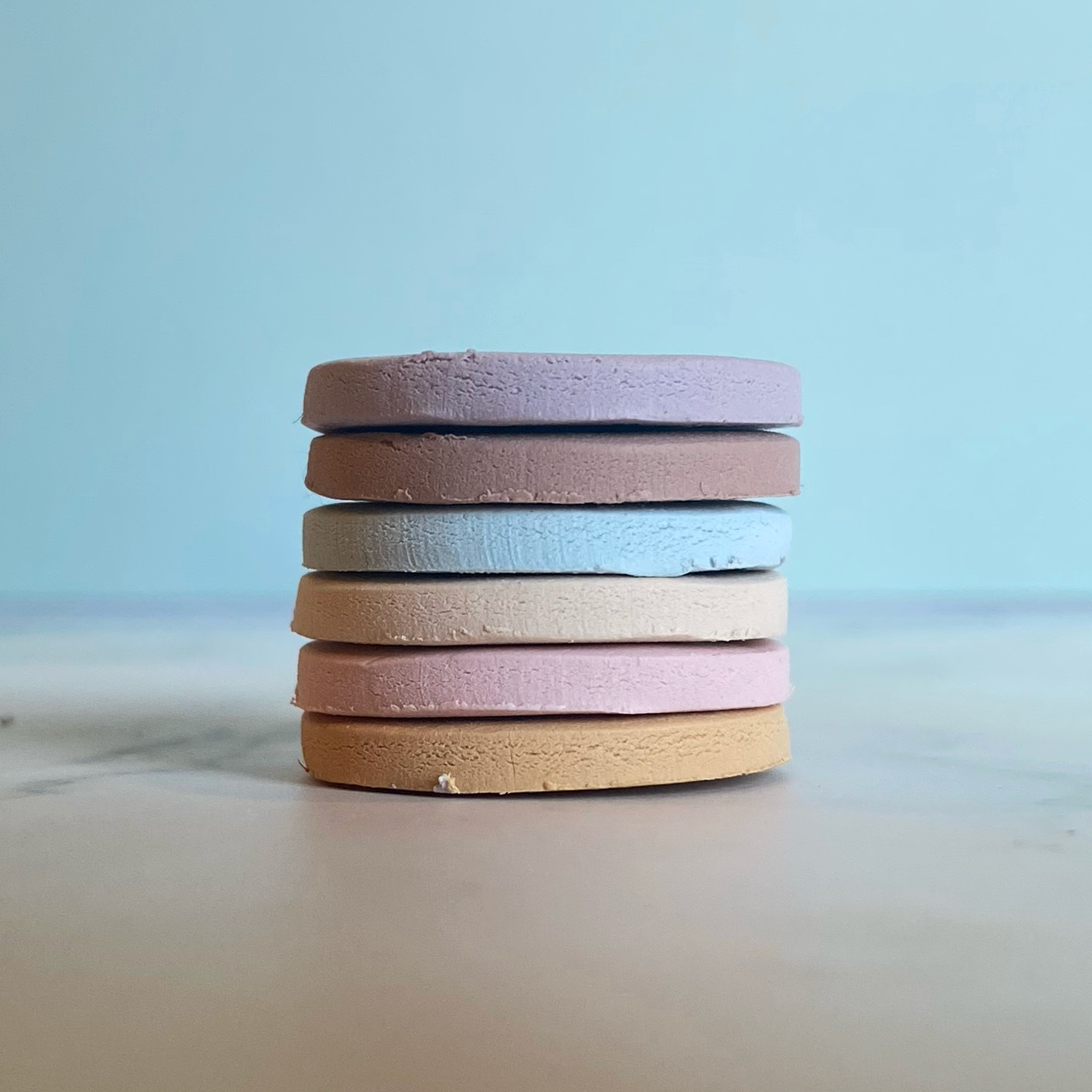 The sample color discs of farmhouse palette in a stack
