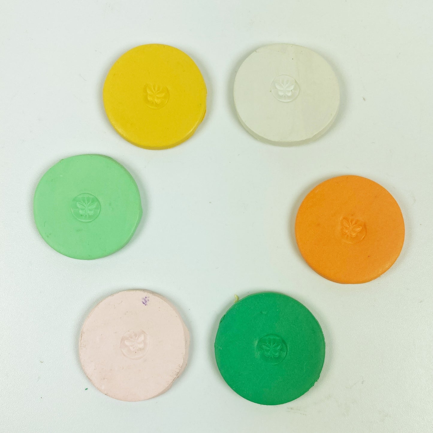 Orange Grove Palette sample discs in a circle