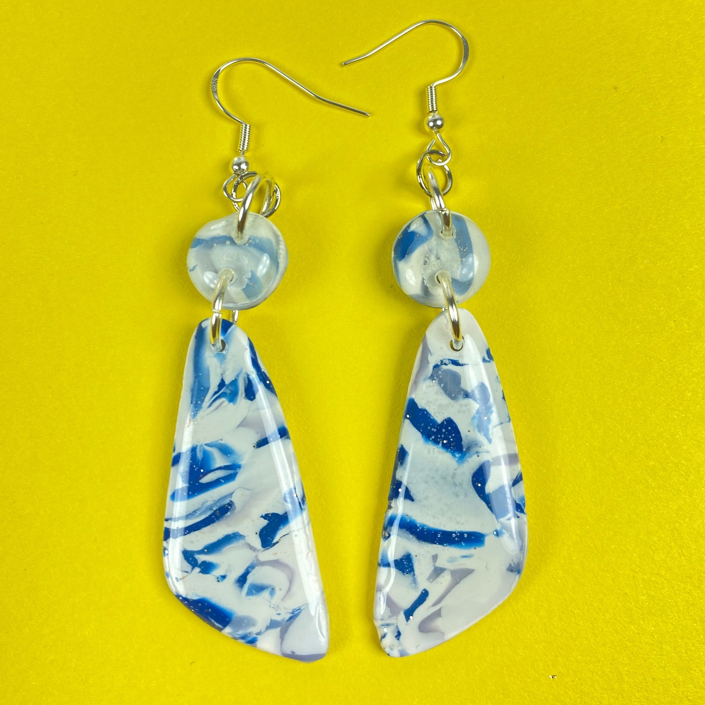 Blue Marble Handmade Polymer Clay Long Dangle Earrings on yellow background