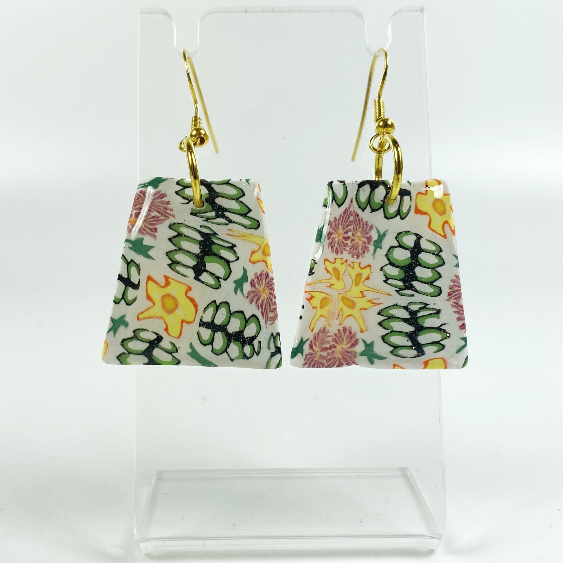 Blossom Burst Handmade Polymer Clay Dangle Earrings on small acrylic display stand