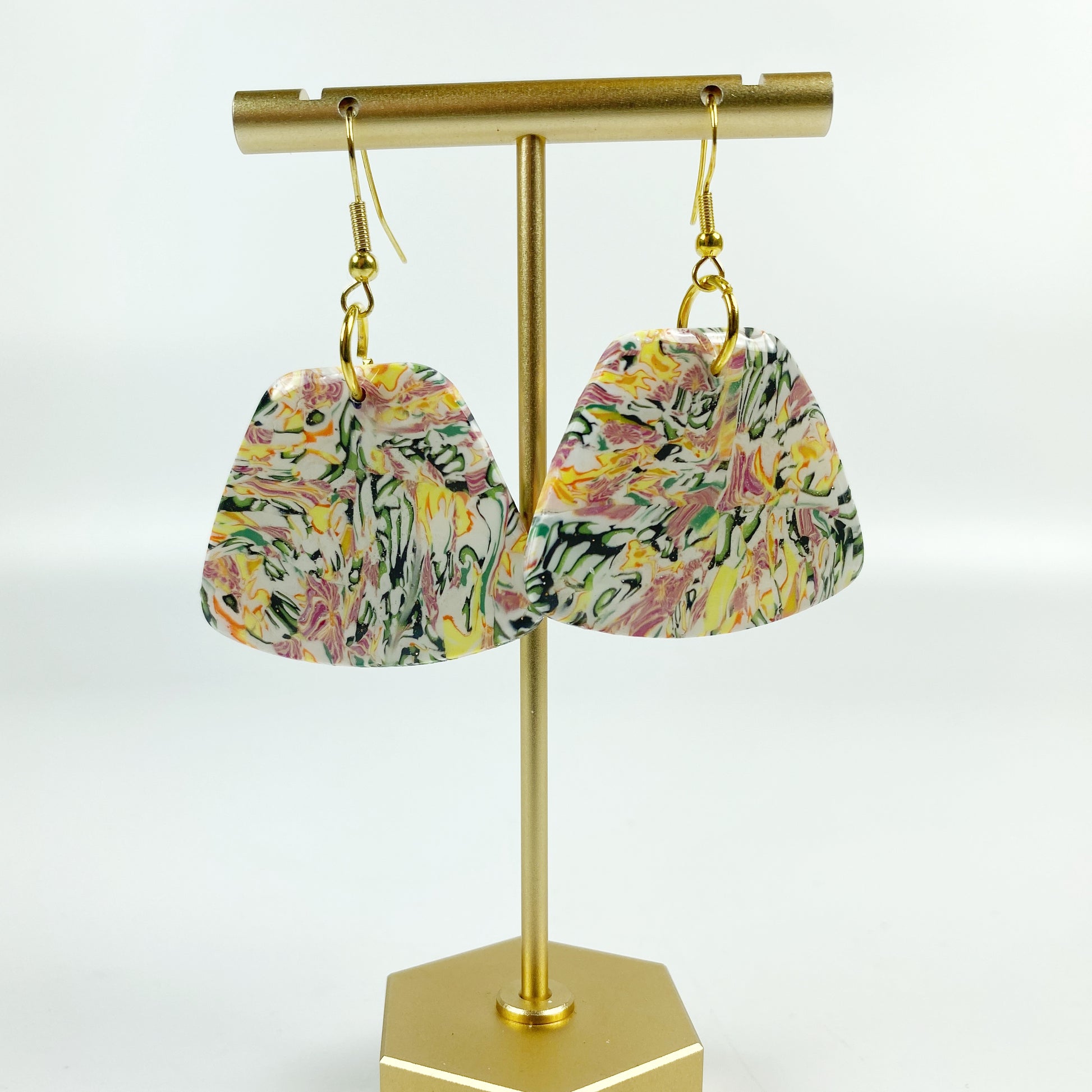 Garden Marbled Handmade Polymer Clay Dangle Earrings on brass display stand