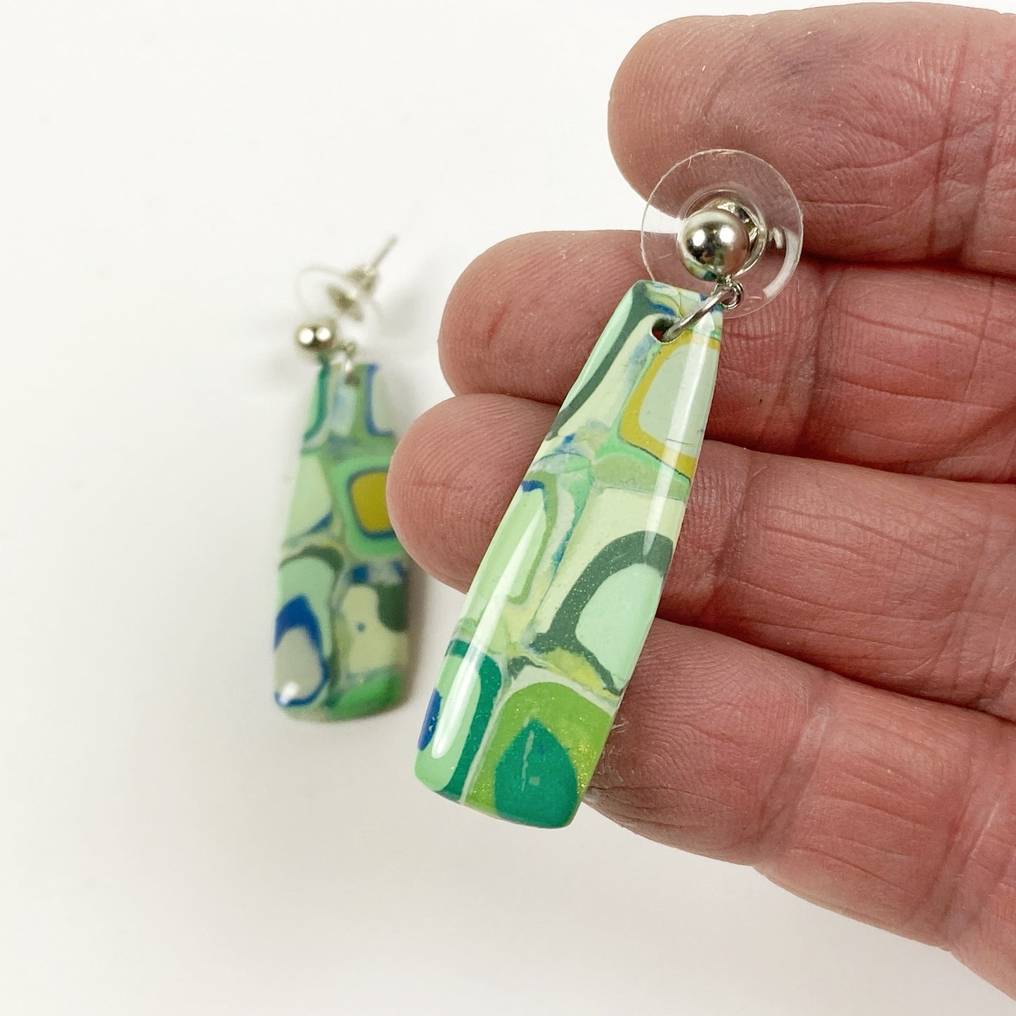 Squares of Green Polymer Clay Handmade Dangle Earrings handheld for size reference