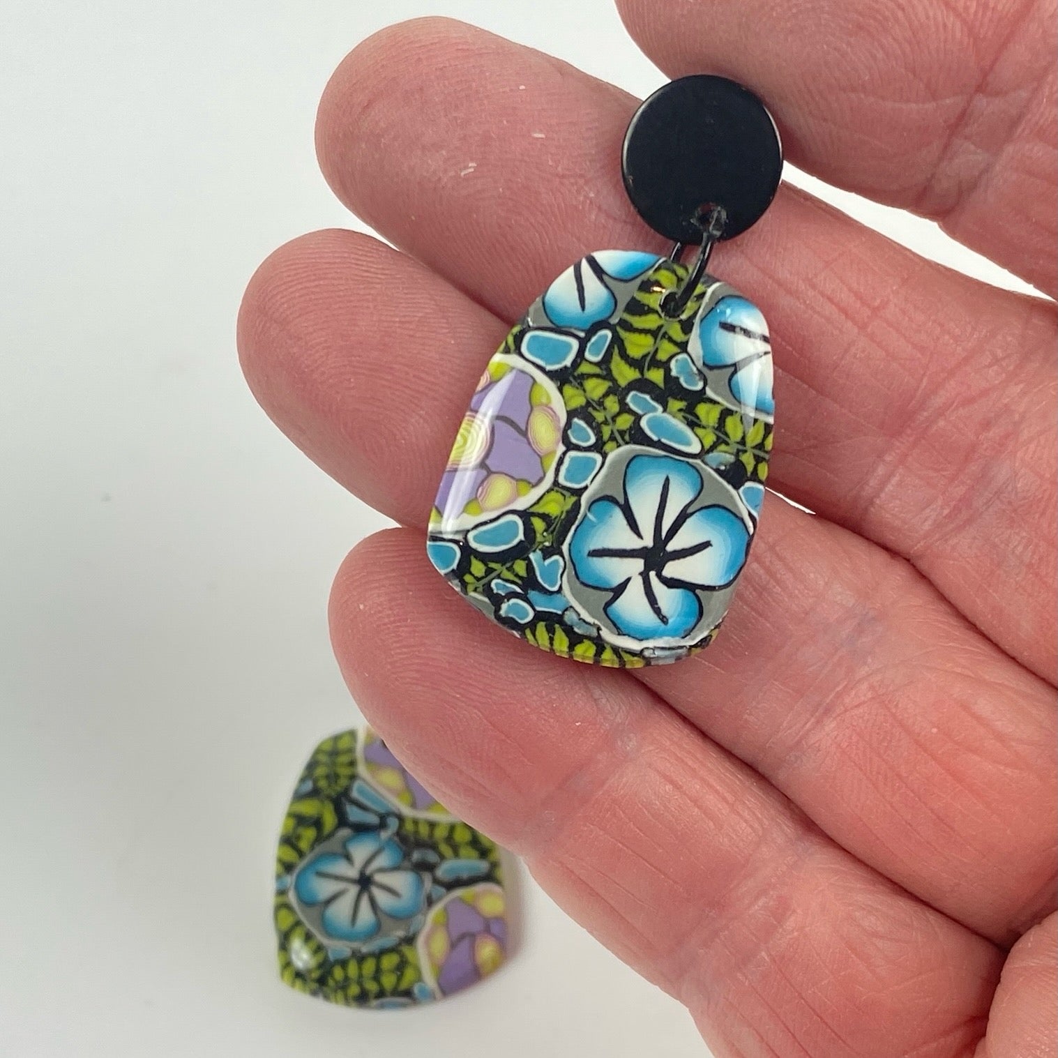 Twilight Blooms Earrings handheld for size reference