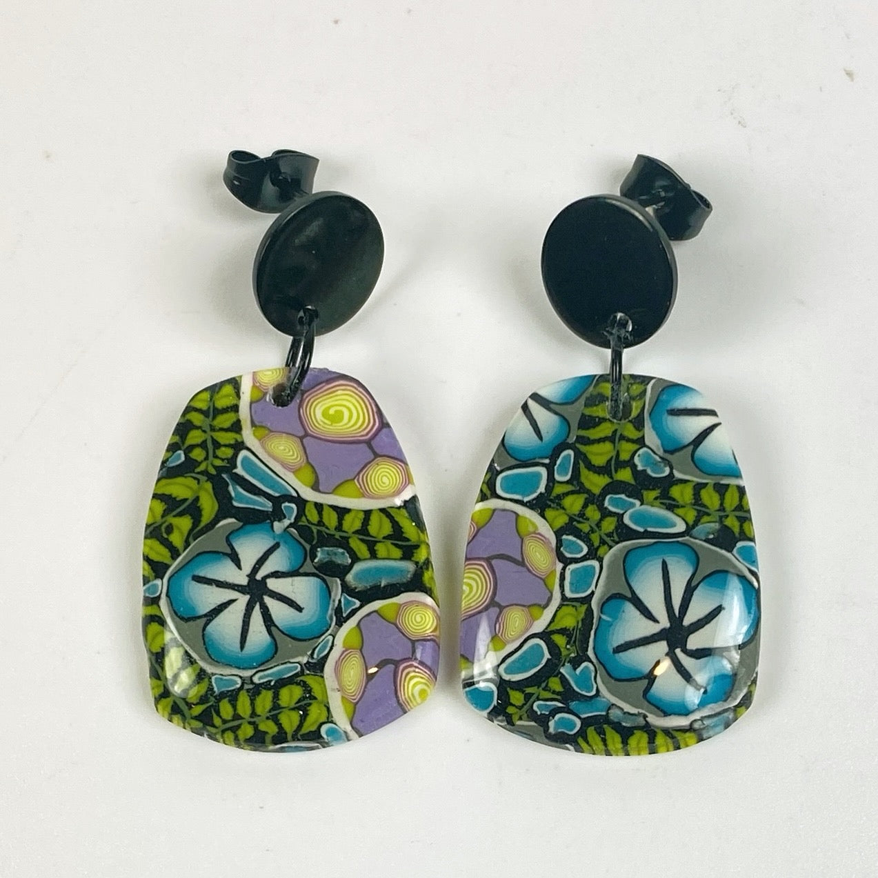Twilight Blooms Earrings on a neutral background