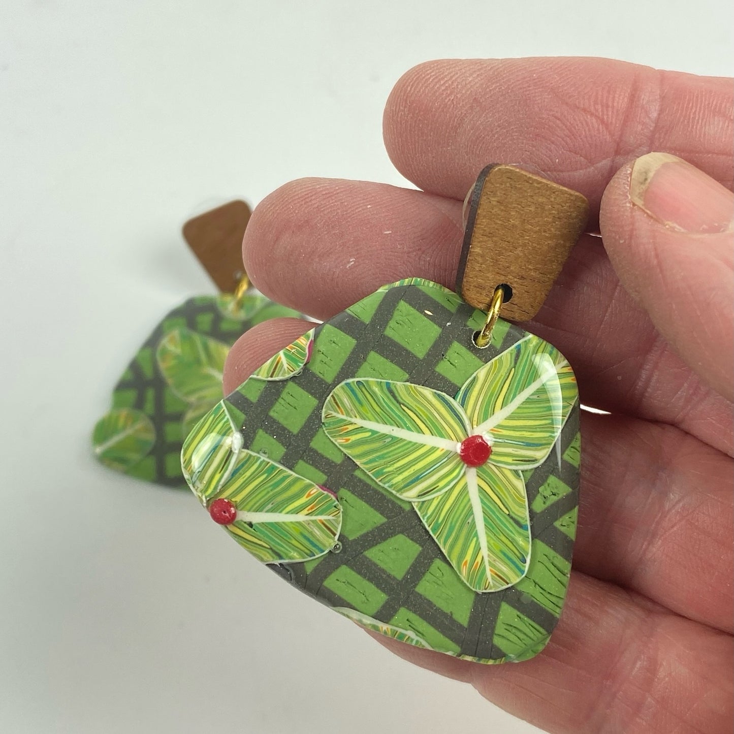 Jungle Canopy Earrings handheld for size reference