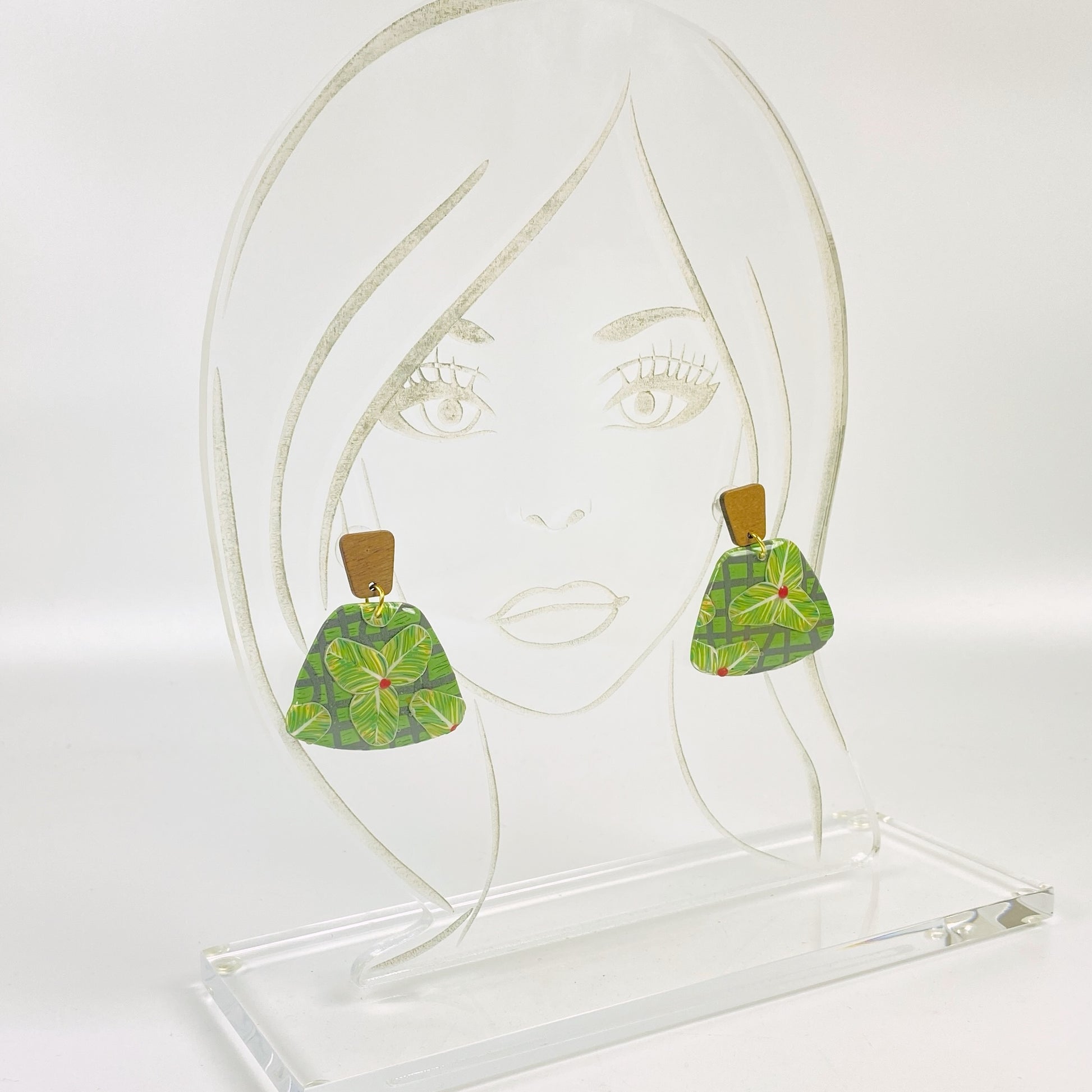 Jungle Canopy Earrings on an acrylic display head