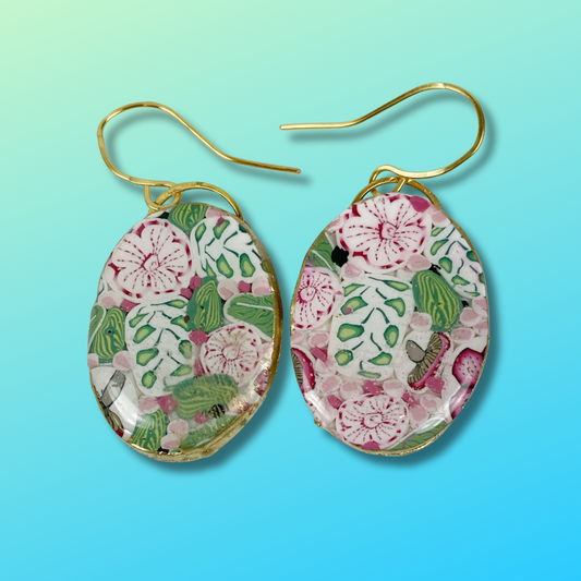 Pink Woodland Handmade Polymer Clay Oval Dangle Earrings on a gradient aqua background