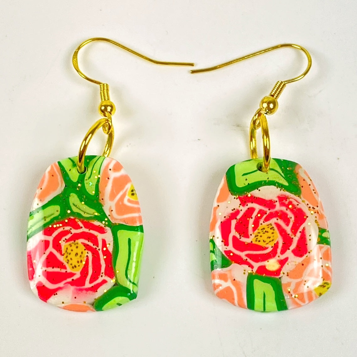 The Roses Handmade Polymer Clay Dangle Earrings on a white background