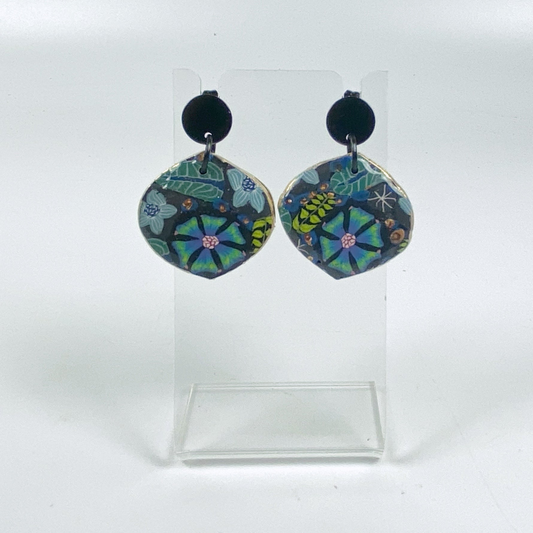 Blue Blossom Handmade Polymer Clay Dangle Earrrings on a small acrylic stand