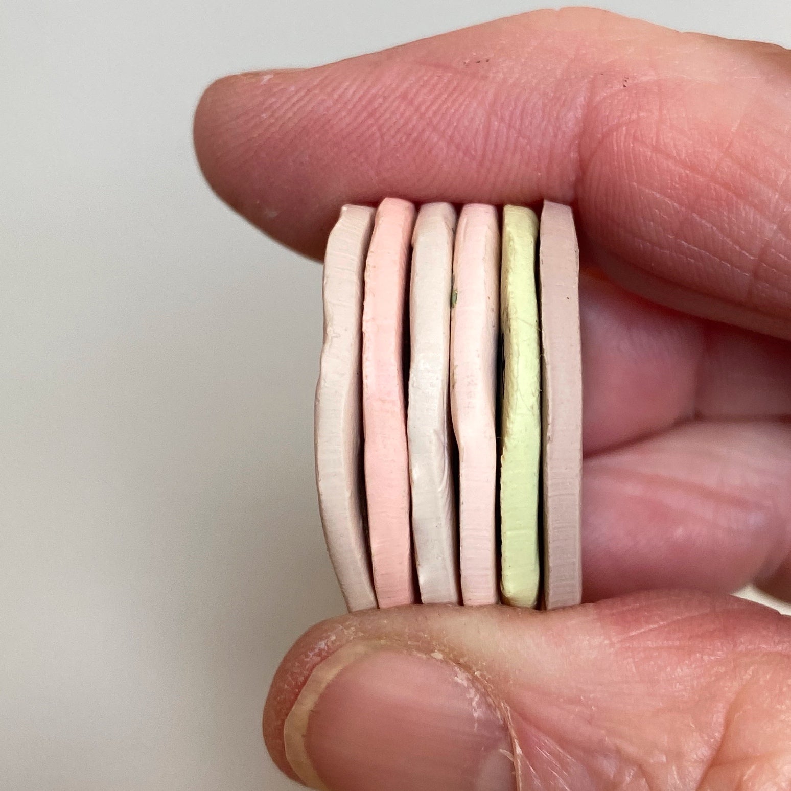 Stacked discs of each polymer clay color in this palette