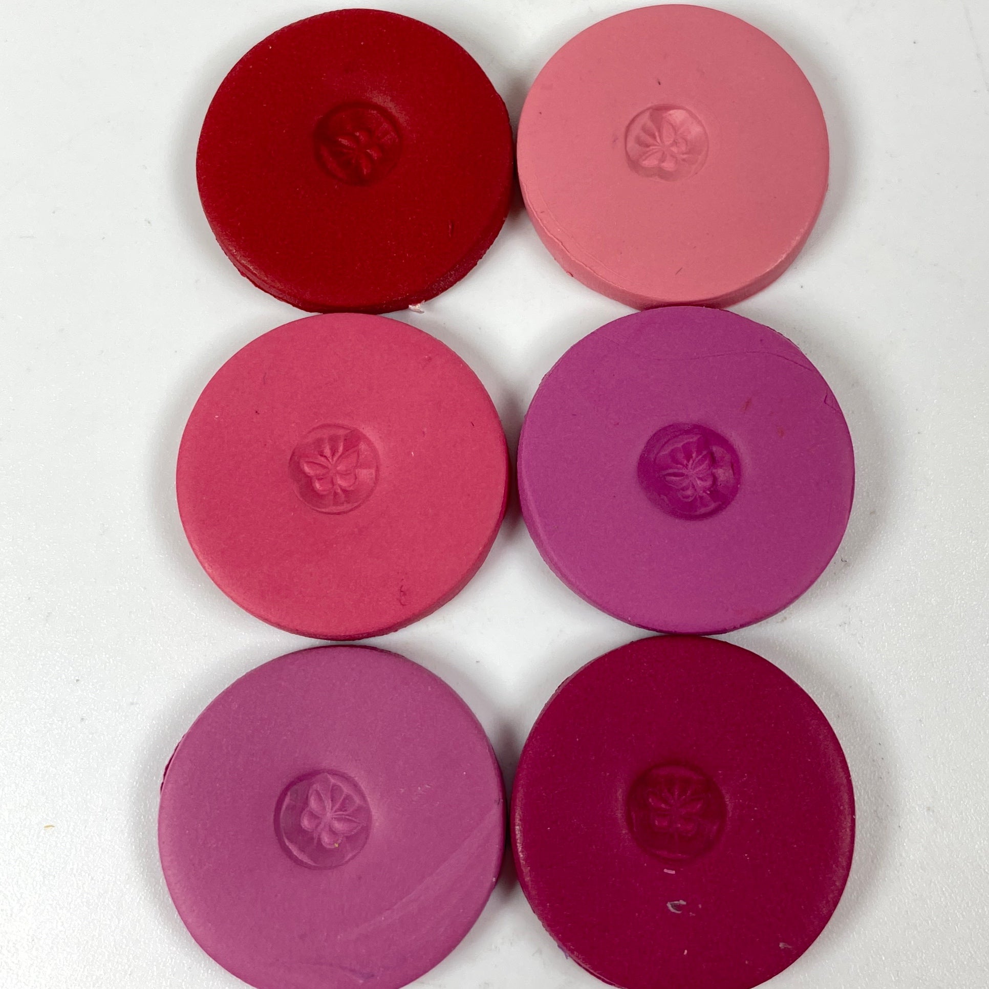 Secret Admirer clay color disks laid out 2 x 3